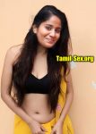 Brigida Saga navel pierced exposing black bra in yellow saree without blouse