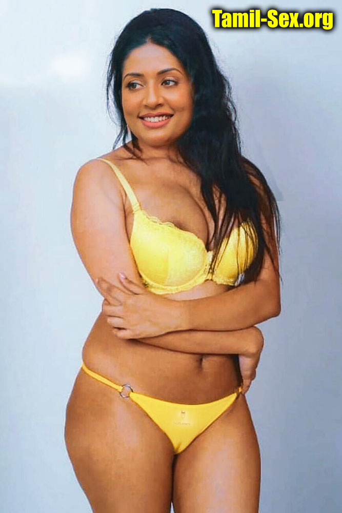 Sexy busty Navya Nair semi nude yellow bra panties photo without dress